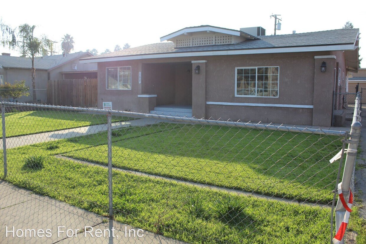 Foto principal - 4 br, 2 bath House - 137 N. Harvard Ave