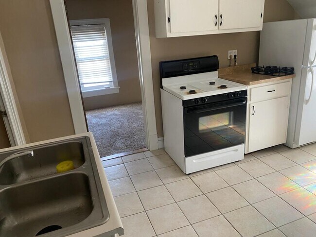 Kitchen looking to bedroom - 4821 Harlem Rd