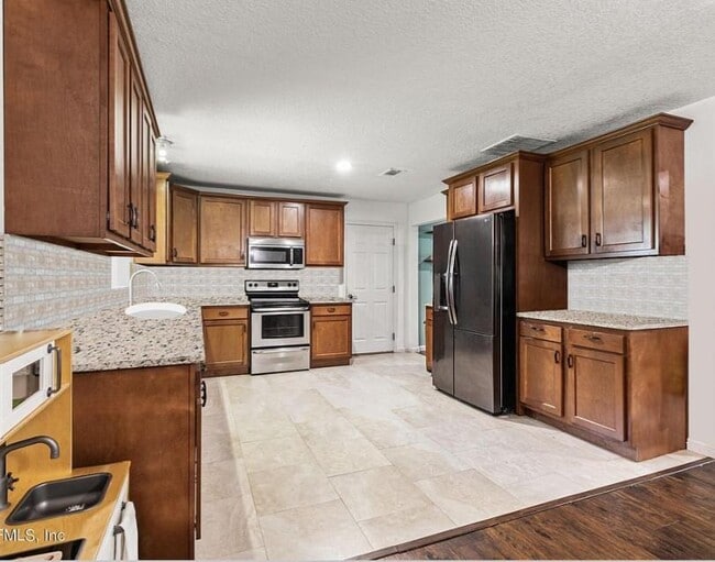 Foto del edificio - 5433 Sanders Rd