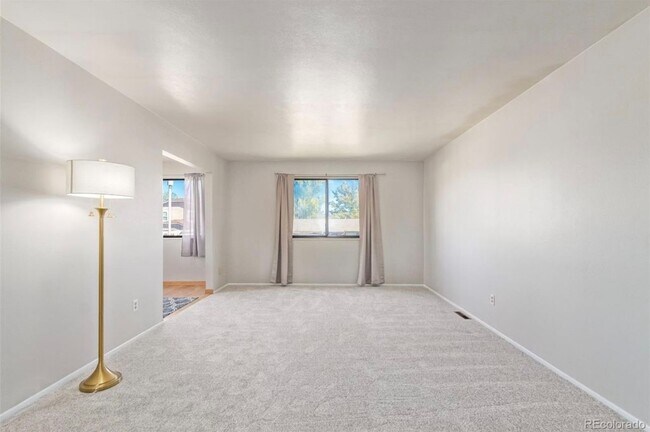 Building Photo - 7056 W Rowland Ave