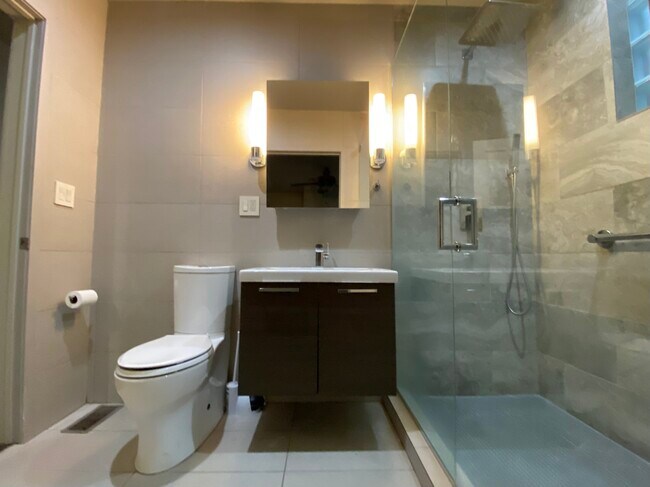 Updated bath - 2850 W Henderson St