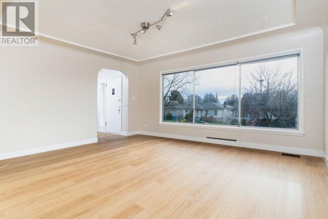 Photo du bâtiment - 57 E 63rd Ave