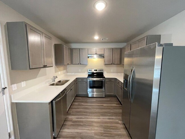 Building Photo - NEW SENIOR COMMUNITY! 55 & UP! 2 bed 2 ful...