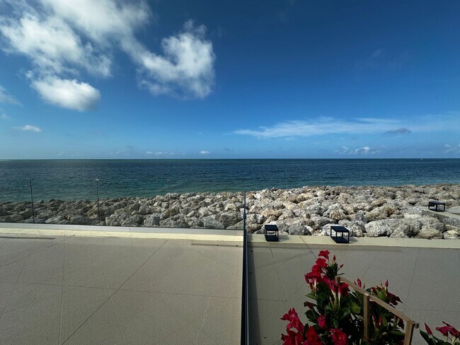 Building Photo - Gulf views from this Cozy 2 Bedroom Condo-...