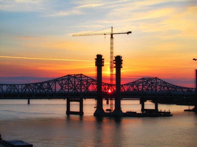 The sun setting behind the John F. Kennedy Memorial Bridge