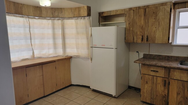 Photo du bâtiment - 454 E 55th Ave