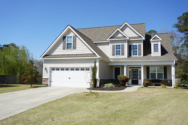 Building Photo - This lovely 4BR/2.5BA is located off Sloop...