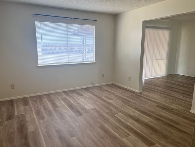 Building Photo - 3 Br, 1.75 Ba, 2 living areas, den with fi...