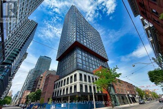 Building Photo - 100 Queen St E