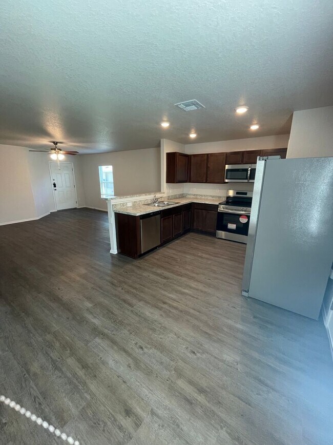 Building Photo - *MARCH MADNESS SAVINGS!* Three Bedroom | T...