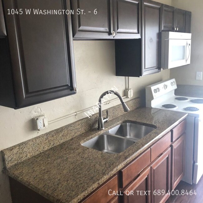 Building Photo - Remodeled 2/1 Upstairs apartment. Available!