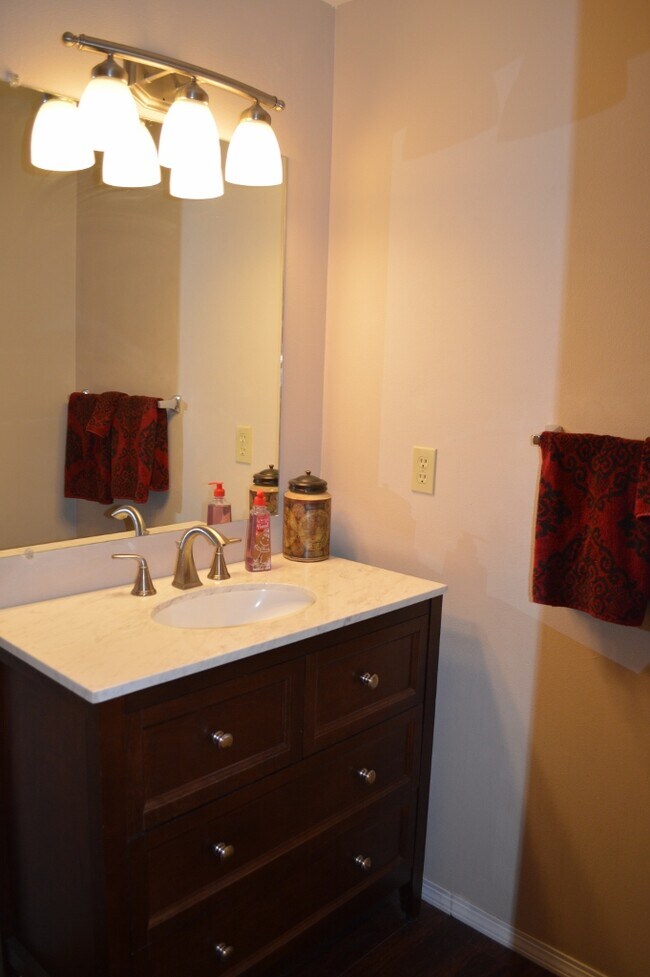 1st floor powder room; tastefully updated! - 8421 Southwest Langtree Street