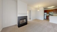 Located at 365 Attenborough Dr in Nottingham, MD, this single-floor, 2-bedroom, 2-bathroom home offers a thoughtfully designed layout with comfortable living spaces throughout. The open-concept living and kitchen area serves as the heart of the home, featuring warm wood cabinetry, granite-style countertops, stainless steel appliances, and a peninsula breakfast bar ideal for casual dining. A pendant light fixture adds a finishing touch to the kitchen. The living room is generously sized, with plush carpeting, a sliding glass door that opens to an outdoor patio with views of surrounding greenery, and a tile-surround fireplace that provides both warmth and visual appeal. Both bedrooms are carpeted and filled with natural light from multiple windows dressed with white horizontal blinds, offering pleasant outdoor views. The bathrooms are clean and functional, with one featuring white tile surround in the shower. Additional highlights include a dedicated in-unit laundry room with full-size washer and dryer hookups, a pantry, and an impressive eight closets providing exceptional storage throughout. A central hallway connects the main spaces efficiently, completing this well-organized and practical home.