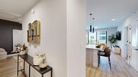 Located at 1556 NW 110th Ave in Sweetwater, FL, this thoughtfully designed single-floor unit is part of a modern multi-story residential building with a landscaped courtyard and pergola structure visible from the private balcony. The interior features light hardwood flooring throughout, crisp white walls, and a clean contemporary aesthetic. The open-concept kitchen is a standout, outfitted with light wood cabinetry extending to the ceiling, quartz countertops, stainless steel appliances including a French door refrigerator and dishwasher, a matte black faucet, and a large center island with seating — all illuminated by sleek pendant lighting. Two living areas provide flexible use of space; the main living room opens directly to a private balcony through floor-to-ceiling sliding glass doors, filling the area with natural light and courtyard views. The entry hallway features decorative accents and connects seamlessly to the living spaces. The bedroom is serene and well-lit, with large windows and warm neutral tones. Both bathrooms are finished with marble-look tile flooring, light wood vanities, matte black fixtures, and glass-enclosed showers. A dedicated walk-in closet with built-in shelving provides ample storage adjacent to the primary bathroom.