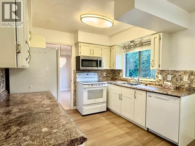 Photo du bâtiment - 5XX3 Wildwood Crescent