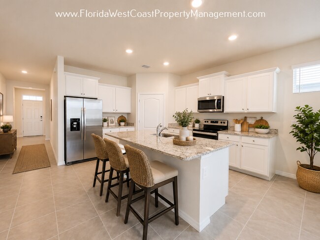 Foto del edificio - COOL COASTAL 4 BED/2 BATH HOME! PALISADES LAKEWOOD RANCH! COMMUNITY POOL/FITNESS ROOM!