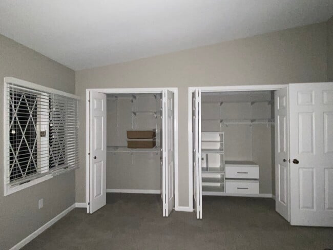 Owner bedroom closet w/ organizers - 12C Dorado Dr