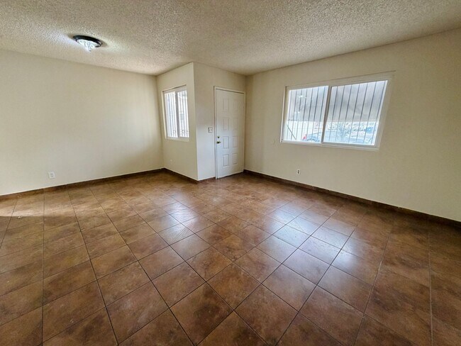 Building Photo - **TWO WEEKS FREE RENT!! ACCEPTS SECTION 8!!** Spacious first floor apartment with large living ro...