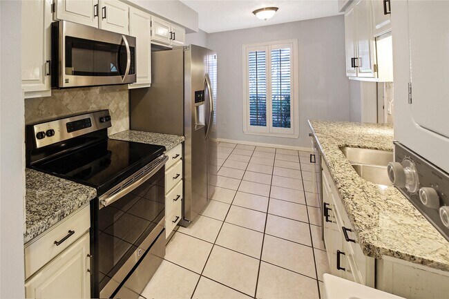 Foto del edificio - 14466 Misty Meadow Ln