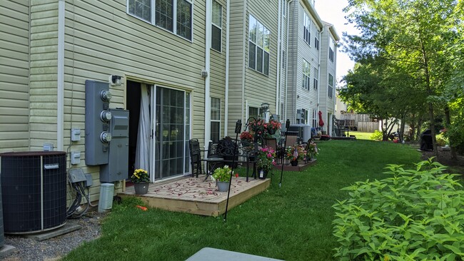 Backyard with new deck - 1002 Foxhunt Terrace NE