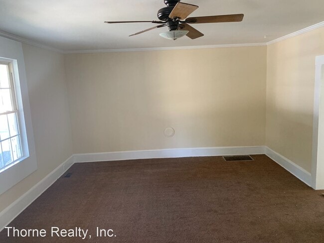 Building Photo - 3 br, 1.5 bath House - 403 W. Howard Ave