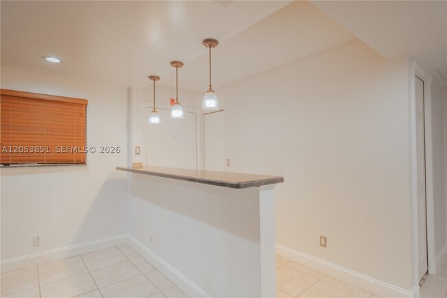 Building Photo - 2700 Coral Springs Dr