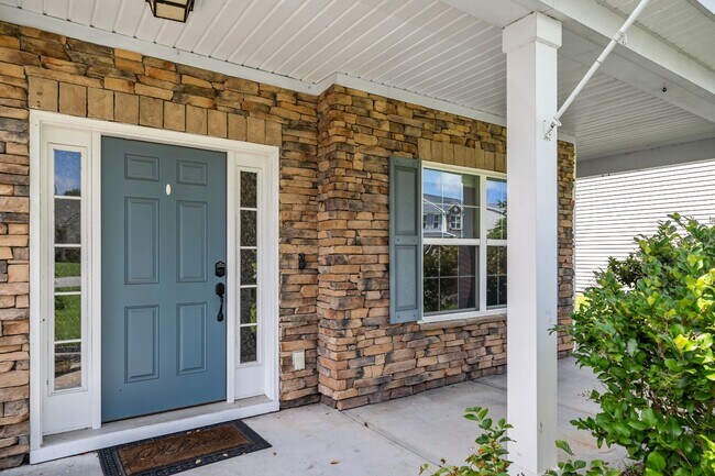 Building Photo - Relax by the Water – 4BR Home with Pond Views in Creekside