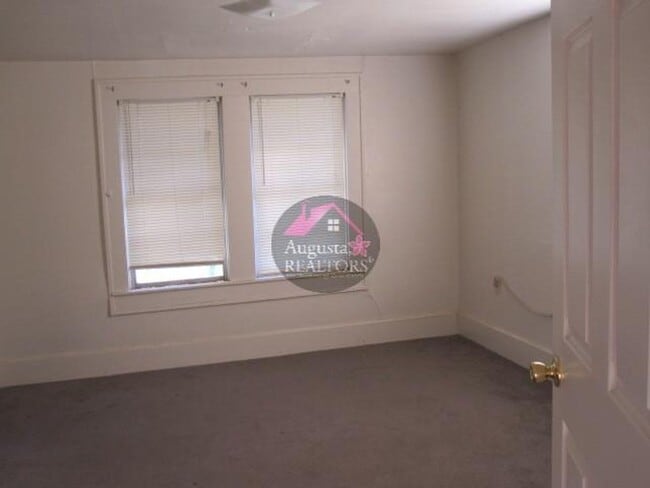 Building Photo - Three