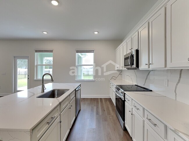 Foto del edificio - 5943 Pinewood Ests Dr