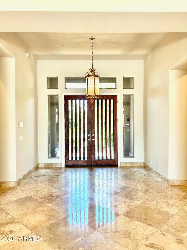 Building Photo - 7484 E Pontebella Dr