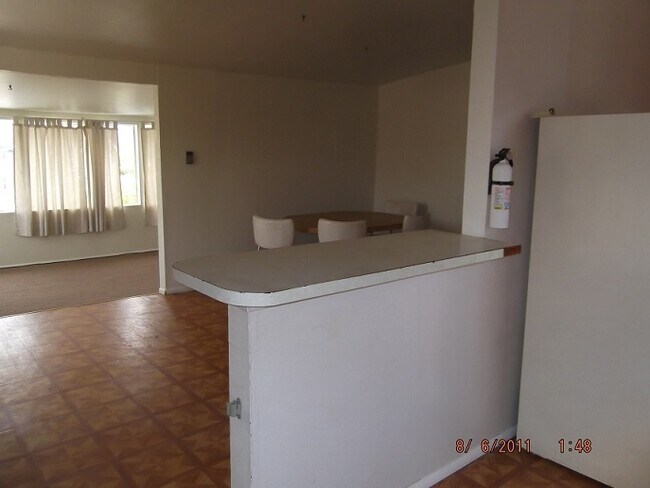 Kitchen Bar to Dining Area - 725 Ericson Dr
