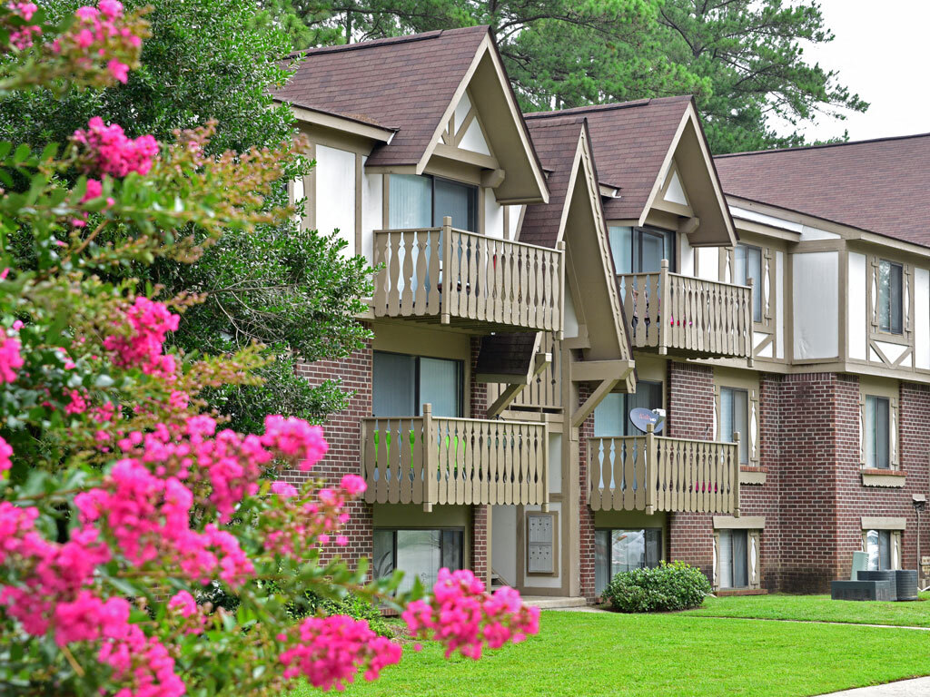 Apartment Building Exterior - Lake in the Pines