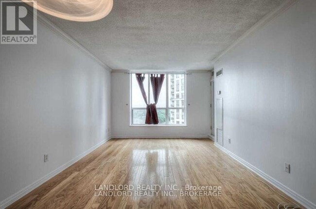 Photo du bâtiment - 55-LP55 Harrison Garden Blvd