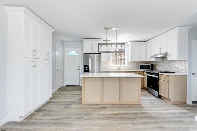 Foto del edificio - 6007 W Jersey Ave