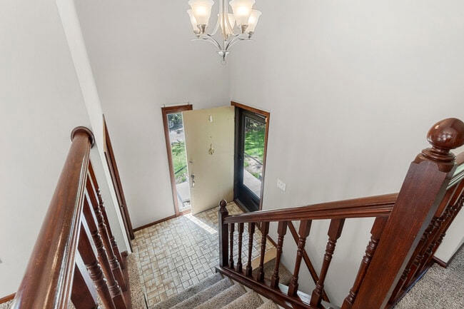 Spacious entry, new paint and stain, new carpet, front closet - 9774 Dorset Ln
