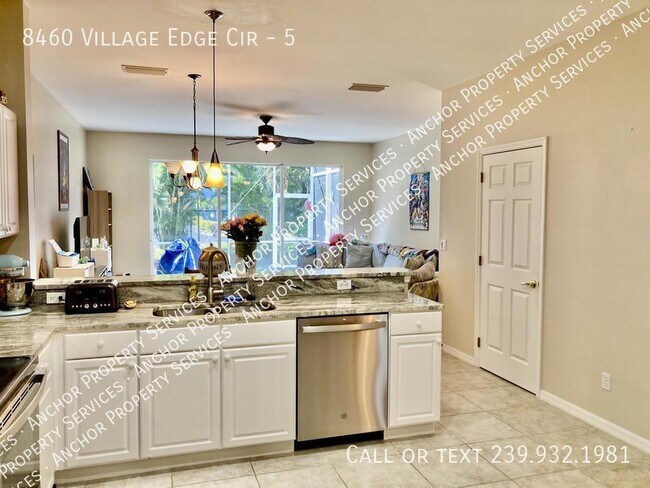 Foto del edificio - 8460 Village Edge Cir