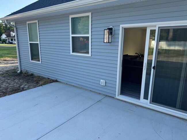 Building Photo - Just steps from the Indian River Bay!