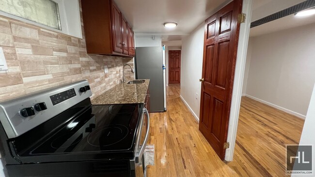 Building Photo - NEWLY RENOVATED 2 BEDROOMS BASEMENT EAST 3...