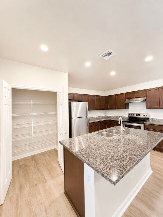 Building Photo - Move in Special + Pets Allowed