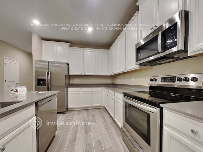 Foto del edificio - 9920 Lemon Grass Ln