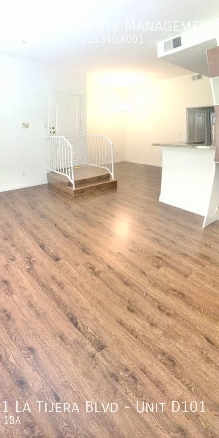 Foto del edificio - Spacious 1 Bedroom Condo with 2 Parking Sp...
