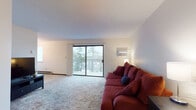 Located at 12 East Rockwood Boulevard in Spokane, Washington, Unit 301 is a thoughtfully arranged single-floor residence that offers a comfortable and functional living environment. The living room is generously sized, featuring plush carpeting, a textured ceiling, and a sliding glass door that opens to a private balcony with tree-lined outdoor views, flooding the space with natural light. Baseboard heating throughout ensures year-round comfort. An adjacent dining area is bright and inviting, highlighted by a classic chandelier overhead and a large window framing views of the surrounding greenery. The kitchen is equipped with warm wood-toned cabinetry, ample counter space, and an electric range with overhead ventilation. The bedroom offers a cozy carpeted retreat with a window providing natural light and additional baseboard heating. The full bathroom features tile flooring, a vanity with storage, and a shower-tub combination. Neutral wall tones and consistent finishes throughout the unit create a cohesive and clean aesthetic. The unit's third-floor position enhances privacy and offers pleasant elevated views, making this Spokane residence a practical and comfortable place to call home.