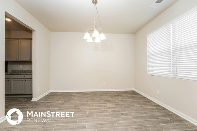 Foto del edificio - 3811 River Rock Rd