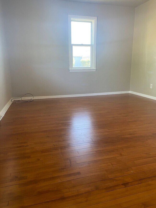 Building Photo - Stylishly Renovated Charming Home on 215 7...
