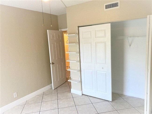 Building Photo - 2500 Coral Springs Dr