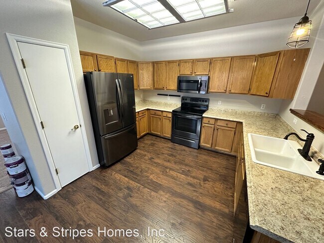 Foto del edificio - 4 br, 2.5 bath House - 19014 E. Prentice C...