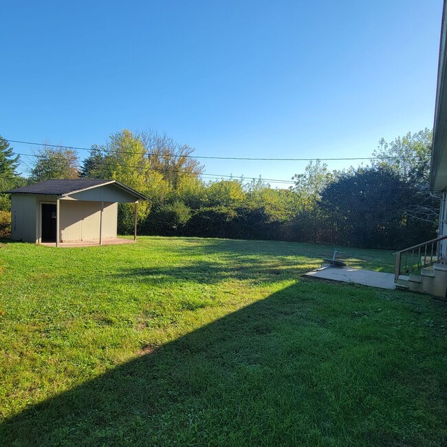 Building Photo - 4 Bedroom, 2 Bathroom Single Family Home-$...