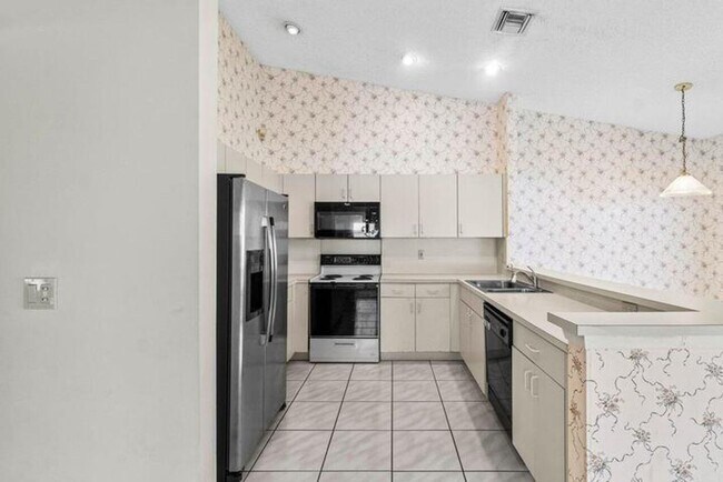 Foto del edificio - 10001 Country Brook Rd