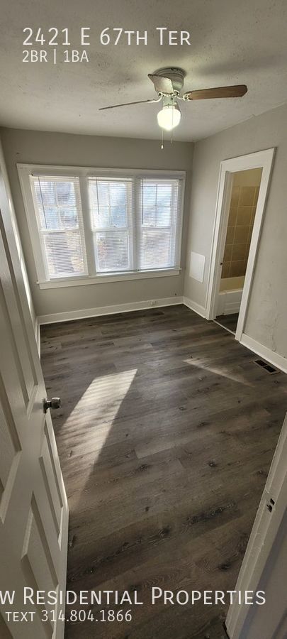 Building Photo - 2421 E 67th TER. | $900 | 2 BR with 1 BATH