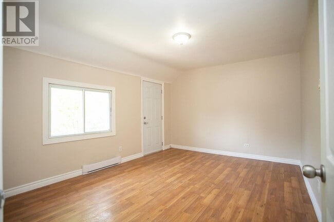 Building Photo - 2 Bedroom Upper-Level Unit – Parking & In-Unit Laundry – $1,549/month + Utilities